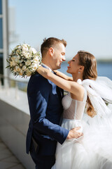 bride and groom first meeting on the roof of skyscraper