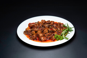 Beef Stew isolated on black background