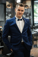 Fototapeta premium groom in the barber shop