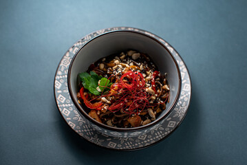 bowl red chili with noodles
