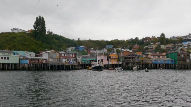 Famous colourful stilt houses in Castro, Chiloe Island. 