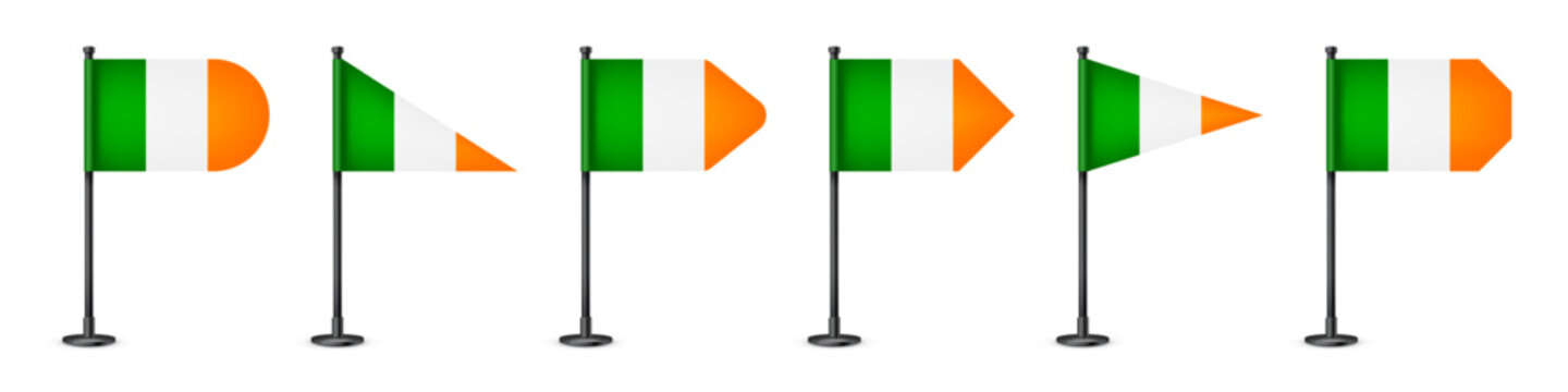 Realistic various Irish table flags on a black steel pole. Souvenir from Ireland. Desk flag made of paper or fabric, shiny metal stand. Mockup for promotion and advertising. Vector illustration