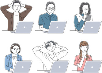 困った表情でノートパソコンを見ているビジネスパーソン