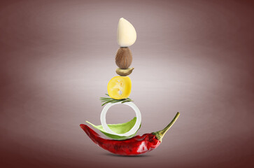 Stacked different aromatic spices on brown background