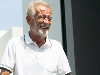 elderly male man portrait gray hair ้happy smile enjoy funny lifestyle senior retirement mature holiday vacation aged face person relaxation handsome love active carefree activity stand walk copyspace