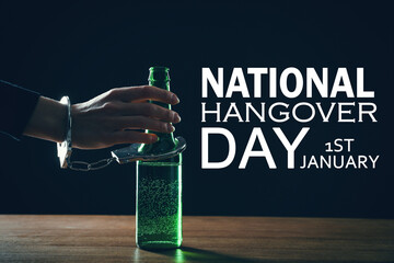National hangover day - January 1st. Woman handcuffed to bottle of beer against black background,...