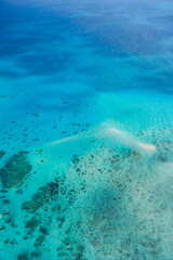 An aerial view of Vlasoff Cay, in the Great Barrier Reef: tropical white sand bar, coral reefs, clear turquoise waters — Coral Sea, Cairns; Far North Queensland, Australia