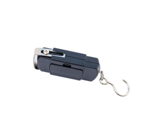 Small portable digital scale isolated on a white background