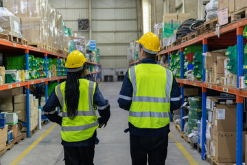 Store clerks inspect products, warehouses, industrial and logistics supply chains.