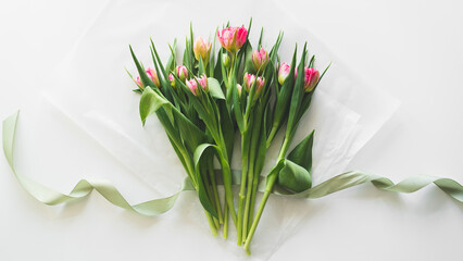 Bouquet of pink fresh tulips. Beautiful Card for Mother's Day or Women's Day.