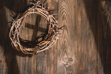 Jesus Crown Thorns and nails and cross on a wood background. Crucifixion Of Jesus Christ. Passion...