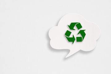 recycle sign inside white cloud speech bubble paper cut on grunge paper background including copy space