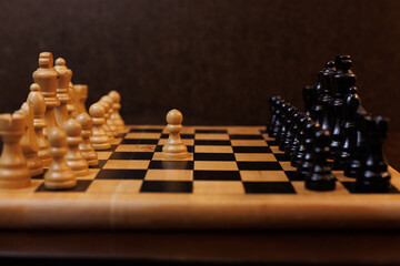 Single Pawn on the check board with a dark background