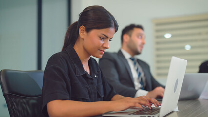 Business woman working at office with team. Business, Teamwork, Corporate, Lifestyle, Technology and Diversity concept.