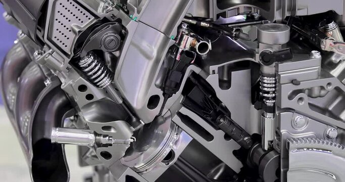 Close up view of cut section of Automotive Internal combustion engine details.