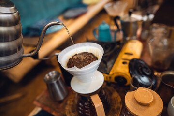 Fototapeta na wymiar Closeup of hand make drip coffee in home