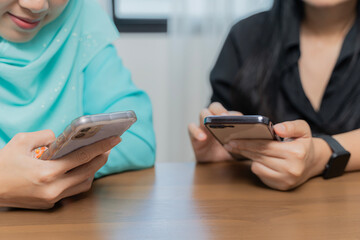 Active on online social media sharing of information. Portrait of two nice attractive lovely charming cheerful cheery glad girls spending free time