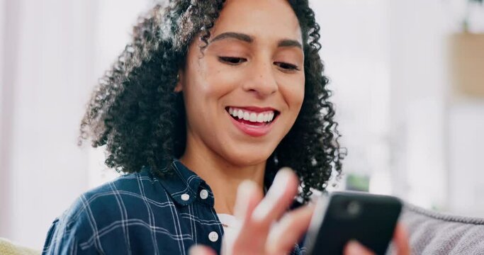 Happy, phone and woman laugh on a sofa with social media, joke or online comic in her home. Online, meme and female relax in a living room while reading, browsing and enjoying streaming subscription