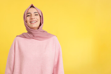 Beauty young muslim woman wearing hijab smiling