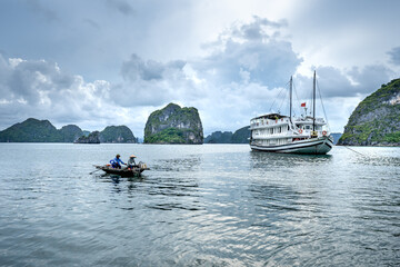 Tourists take a boat to visit Lan Ha Bay. An ideal beach tourist destination in Quang Ninh province, Vietnam