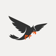 A black crow with orange claws is flying in a circle.