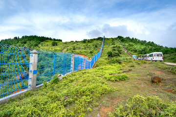 Fototapeta na wymiar The border fence and the 1326 landmark delimiting the boundary between Vietnam and China in Quang Ninh Province, Vietnam