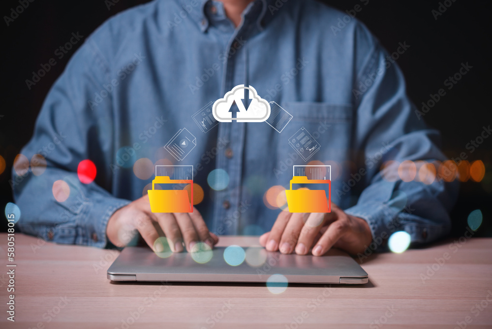 Poster business man using laptop upload and download files document with cloud technology on viritual screen, document management data transfer system