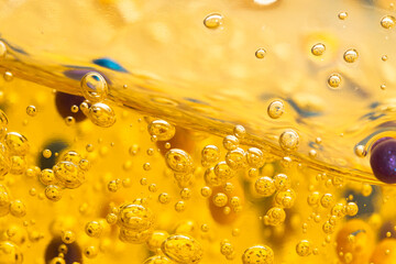 Liquid gel, serum with bubbles front view. Moisturizer, soap, cosmetic product macro.