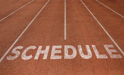 Schedule written on running track, New Concept on running track text in white colour