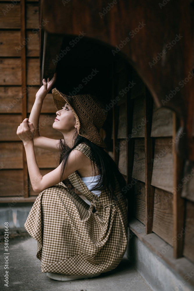 Wall mural portrait of an asian young woman