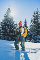 Mountaineer backcountry ski walking ski alpinist in the mountains. Ski touring in alpine landscape with snowy trees. Adventure winter sport. Kralova hola, Slovakia © Zedspider