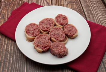 Slices of traditional Italian sausage Zampone di Modena.