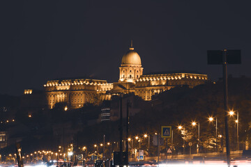 Buda Castle at night from Danube river, Hungary