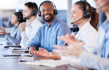 Obraz premium Contact us, call center or portrait of friendly black man in telecom communications company in help desk. Happy smile, crm or face of sales agent working online in technical or customer support