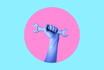 Art collage. Hand with a wrench in neon.