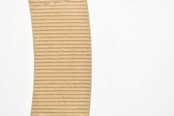 closeup brown paper cardboard texture on white background