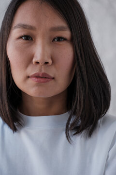 Close-up of young Asian beautiful woman. Isolated white background.Beauty and Healthy Woman.