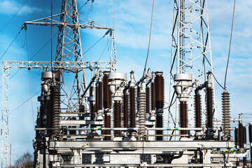 High voltage circuit breaker in a power substation.Electric power transmission lines in the evening. High voltage switchgear and equipment of power plant.