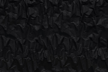 black crumpeled wrapping rough paper pattern for background