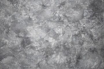 Background Stone wall background with abstract spots. Beautiful gray marble texture with stains, abstract surface background. Finishing stone for building cladding. Furniture granite.