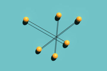 Connection, communication, teamwork and organization concepts. Group of rods with yellow spheres attached to each other.