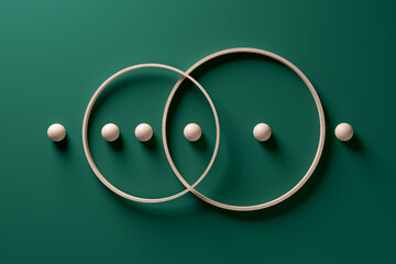 Crossing wooden rings with spheres in a row on green background. - obrazy, fototapety, plakaty