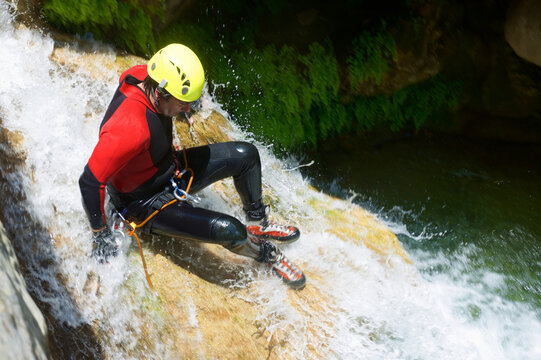 High angle view of hiker canyoneering at Aragon