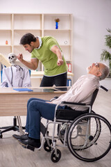 Fototapeta na wymiar Old patient in wheel-chair visiting skeleton doctor