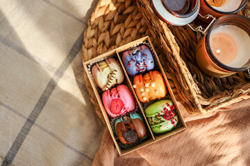 Box of macaroons with different assortment top view in a homely atmosphere
