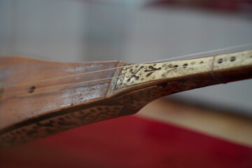 Almaty, Kazakhstan - 03.17.2021 : Ancient national musical stringed instruments with Kazakh...