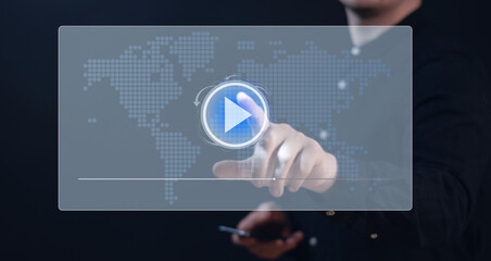 Businessman's hand presses the play button on digital augmented reality screen. The concept of starting a new startup. The concept of starting a new business