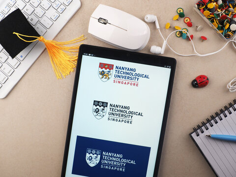 In this photo illustration, Nanyang Technological University, Singapore (NTU)  logo seen displayed on a tablet.