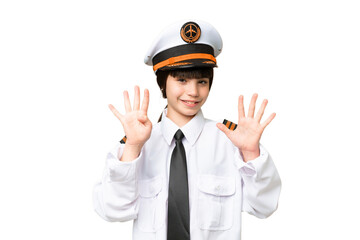 Little girl as a Airplane pilot over isolated chroma key background counting nine with fingers