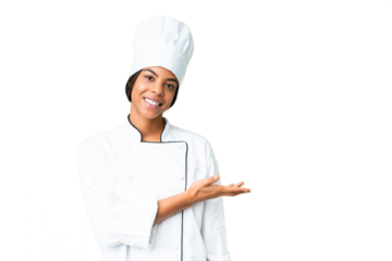 Young African American chef over isolated chroma key background presenting an idea while looking smiling towards